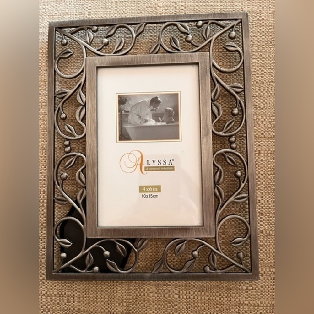 Vintage silver color frame.